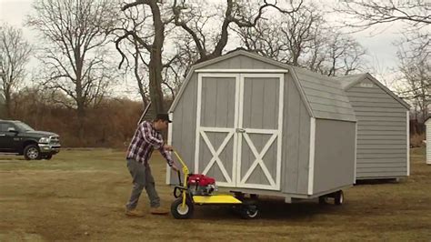 moving shed with skid steer|building moving dollies for shed.